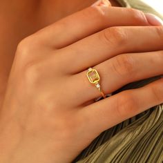 "Indulge in the timeless elegance of our 14K gold rings, meticulously crafted to enhance your personal style. Each ring is expertly made from genuine 14K gold, radiating a warm and luxurious glow that will captivate all who lay eyes on it. Our collection boasts an array of stunning designs, ranging from sleek and minimalist to intricate and ornate, ensuring there's a perfect ring to match your unique taste. Whether you're looking for a statement piece to dazzle at special occasions or a delicate band for everyday elegance, we have something to suit every occasion. Crafted with exceptional attention to detail, our 14K gold rings showcase exquisite craftsmanship that stands the test of time. The high-quality gold ensures lasting durability, allowing you to cherish your ring for years to come November Birthstone Rings, Elegant Citrine Birthstone Ring, Yellow Gold Citrine Birthstone Ring For Gift, Adjustable Citrine Birthstone Ring, Dainty Citrine Ring Jewelry, Elegant Citrine Solitaire Birthstone Ring, November Birthstone Ring, Promise Rings For Her, November Birthstone