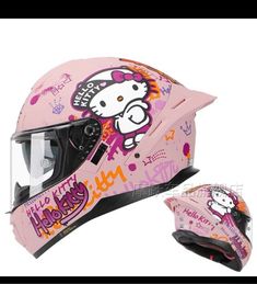 a pink helmet with hello kitty on it