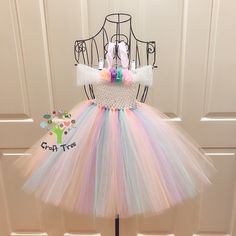 Welcome to Craft Tree AUS ♥This teal peach lavender pink tutu dress will ship out within 3-5 business days. ♥Custom orders are welcomed in any colors and sizes.  ♥Please send me messages about your thoughts/ideas and we can work out together. ♥This is Made-To-Order one piece tutu dress that comes with: TOP - Elastic unlined crochet bodice which is stretchy enough with some room to grow EMBELLISHMENTS - Chiffon flowers  STRAPS - Satin soft ribbons that are very gentle and fully adjustable  BOTTOM Cute Multicolor Fairy Dress For Spring, Whimsical Tutu Dress For Easter Dress-up, Cute Multicolor Princess Dress For Easter, Sweet Tutu Dress For Dress-up, Cute White Princess Dress For First Birthday, Sweet White Princess Dress For Birthday, Cute Multicolor Princess Dress For First Birthday, Fitted Fairy Dress For Summer Birthday, Fitted Fairy Dress For Birthday In Summer