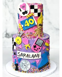 a birthday cake that is decorated with various items