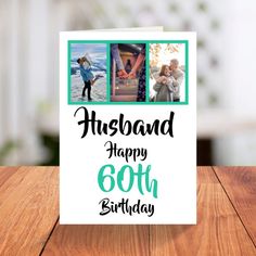 a greeting card with two photos and the words husband happy 60th birthday on it, sitting on a wooden table