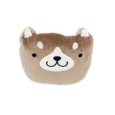 a brown and white bear pillow on a white background