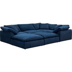 a large blue sectional couch with pillows on the bottom and back ends, in front of a white background