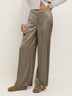 Let your pants do the talking. Shop the Norah Wide Leg Satin Pant, a sustainable pants from Reformation. Silk Bottoms For Work, Elegant Silk Pants With Relaxed Fit, Elegant Relaxed Fit Silk Pants, Elegant Relaxed Fit Long Pants, Elegant Relaxed Fit Bottoms, Silk Pants For Workwear In Fall, Relaxed Fit Silk Trousers, Chic Silk Pants With Relaxed Fit, Elegant Silk Bottoms With Relaxed Fit