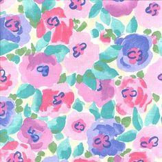 a pink and blue flowered fabric with green leaves on the bottom, purple flowers in the middle