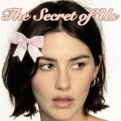 a magazine cover with a woman's face and pink bow on the front page