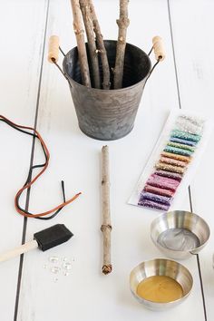 the tools needed to make this craft include sticks, paint and glue