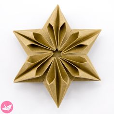 an origami star on a white background