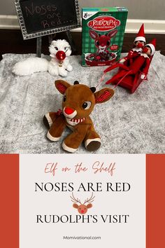 two stuffed animals sitting on top of a bed next to a sign that says elf on the shelf noses are red rudolph's visit