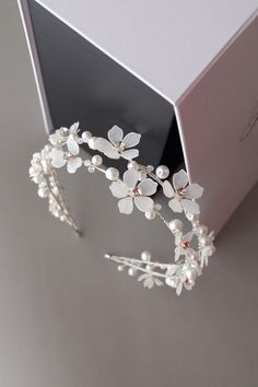 Bridal headband floral, White flower headband, Wedding headband for bride, Bride headband, Bridal headpiece floral, Flower headpiece, Floral bridal tiara This exquisite wedding blossom double headband is a perfect choice for a modern bride! It looks great even if you are keeping long curls or straight hair.  The accessory is attached to a silver headband for a secure fit. The flowers are made of UV resin, that is the new trend in handmade jewelry. Each petal is created manually.  - Flexible, eas Wedding Blossom, Headband For Bride, White Flower Headband, Double Headband, Flower Headband Wedding, Wedding Accessories For Bride, Flower Headpiece Wedding, Flower Hair Accessories Wedding, Wedding Headpieces