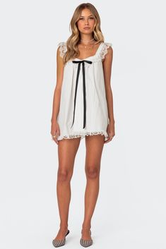 Rayne Lacey Babydoll Mini Dress – edikted A-line Mini Dress With Ruffle Hem For Daywear, Feminine A-line Mini Dress With Lace Trim, Spring A-line Mini Dress With Lace Trim, Coquette Mini Dress With Lace Trim, Summer Dress With Ruffle Hem, White Feminine Dress With Contrast Lace, Summer Coquette Dress With Ruffle Hem, Spring Coquette Mini Dress, Summer A-line Mini Dress With Lace Trim