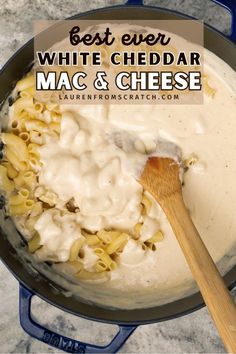 macaroni and cheese being cooked in a skillet