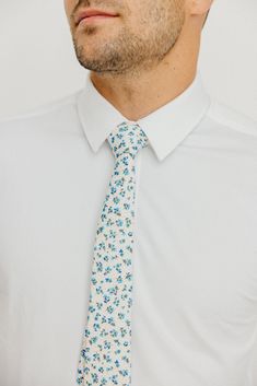 We pride ourselves in offering our customers some of the best skinny ties money can buy. Each DAZI tie is handmade from high quality imported fabrics. Available in 2 Sizes: Skinny - 2.5" Width, 58" Length Wide - 3" Width, 60" Length Fabric: Handmade from 100% Cotton Fitted Cotton Suit And Tie Accessories, Cotton Ties For Black Tie Events In Summer, Cotton Ties For Black Tie Occasions In Summer, White Cotton Ties For Formal Occasions, Dapper Fitted Tie, Dapper Fitted Standard Tie, Dapper Standard Tie, Cotton Standard Tie Perfect For Gifts, Cotton Standard Tie Suitable For Gifts