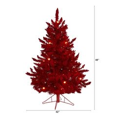 a small red christmas tree on a white background