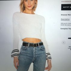 100% Acrylic Flared Sleeve White Trendy Sweater With Ribbed Cuffs, Trendy White Sweater With Ribbed Cuffs, Edgy White Top For Fall, Trendy White Tops With Ribbed Cuffs, White Fitted Sweater For Streetwear, Edgy White Winter Top, Edgy White Tops For Winter, Casual White Cropped Sweater, Black Cropped Sweater