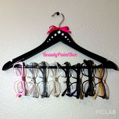 an eyeglass hanger is hanging on the wall