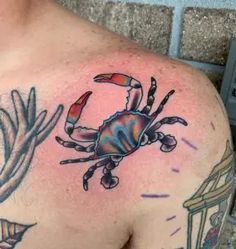 a man with a crab tattoo on his chest