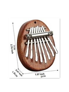 a small wooden instrument with metal handles on the front and sides, measurements for each musical instrument