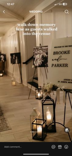 a sign with candles in front of it that says, walk down memory lane as guests walked into the venue