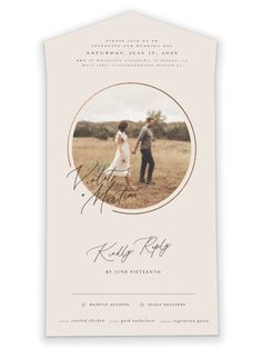 the wedding program card features an image of two people holding hands and standing in a field