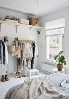 two pictures of clothes hanging on the wall and in front of a mirror