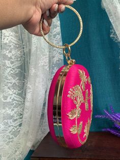 Fashion handbag / clutch . Gold plated hardwire. Crystal work. Velvet body and hand embroidery. Pink Shoulder Bag With Handwork For Party, Elegant Pink Shoulder Bag For Festive Occasions, Gold Embroidered Clutch As Gift, Embroidered Handheld Clutch For Events, Event Clutch With Detachable Handle, Pink Clutch With Handwork For Evening, Gold Embroidered Pouch Clutch For Party, Pink Clutch Evening Bag With Detachable Handle, Gold Embroidered Clutch Bag For Events