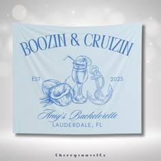 a blue banner with an anchor and drink on it that says boozin & cruzin