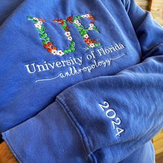 Custom College Floral Embroidered Sweatshirt, Floral Letter Embroidered Hoodie, College Hoodie Sweatshirt, High School Shirt, Graduation Gift ----------------------------- 🎁Introducing our Custom College Floral Embroidered Sweatshirt, the perfect way to showcase your college pride in style. Our Floral Letter Embroidered Hoodie is made with premium-quality materials and features custom embroidery that showcases your school's floral emblem. Whether you're looking for a comfortable college crew or a stylish high school hoodie, this sweatshirt is the perfect choice. It also makes a great graduation gift for any student. With our Custom College Floral Embroidered Sweatshirt, you'll be able to show off your school spirit in a unique and eye-catching way. 1️⃣Available colors: 👉 Brand: Comfort C University Hoodies, Hoodies Aesthetic, College Gear, Pet People, Great Graduation Gifts, Outline Designs, College Hoodies, Embroidered Sweatshirt