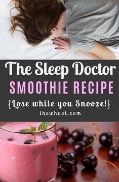 a woman laying in bed next to a glass of smoothie with cherries on the side