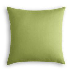 a green pillow on a white background