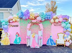 a princess themed birthday party with balloons and decorations