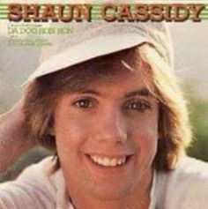 the album cover for shaun casssidy, featuring a smiling man in a white hat