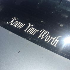 an image of know your worth sticker on the hood of a car