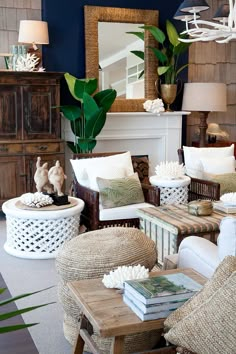 a living room filled with lots of white furniture