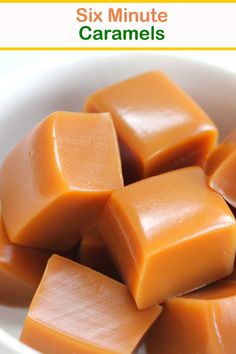 a white bowl filled with caramels on top of a table