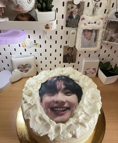 there is a cake with a photo on it