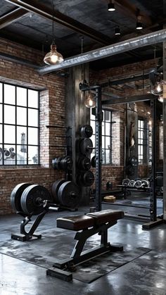 an empty gym with benches and weights