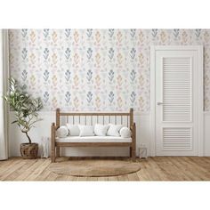 a wooden bench sitting in front of a wallpapered room with a potted plant