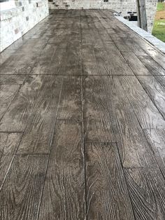 the back end of a truck with wood flooring