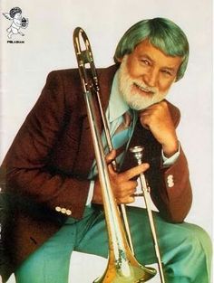 an older man with green hair holding a trombone