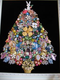 a christmas tree made out of many different types of beads and other things on it