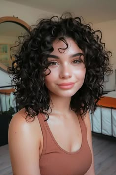 Curly haircuts are all about celebrating your texture and finding a style that complements your face shape. Whether you have loose waves, bouncy spirals, or tight coils, there’s a curly haircut out there that will Low Maintenance Haircut Curly Hair, Short Haircut For Curly Hair Girl, Curly Haircut Square Face, Short Curly Haircuts Round Face Women, Short Curly Haircuts For Oval Faces, Short Curly Haircuts Oval Face, Curly Hair Heart Shaped Face, 2c 3a Hairstyles, Short Curly Haircuts Round Face