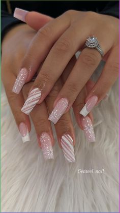 White Candy Nails inspired nails by Genteel Nail Salon. White candy cane nail design | French tip nail art | Sparkly Nails | Glitter Nails | Fall Nails French Candy Cane Nails, Pink And White Candy Cane Nails, Pink Sparkly Christmas Nails, Pink And White Holiday Nails, Christmas Nails Acrylic Glitter, White French Christmas Nails, Christmas Minimalist Nails, Cute Pink Christmas Nails, White Glitter Christmas Nails