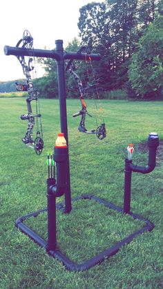 an outdoor archery set up in the grass