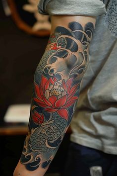 How Geisha Symbolize Fertility and Fortune in Yakuza Culture Japanese Elbow Tattoo, Japanese Tattoo Flower, Japanese Lotus Tattoo, Lotus Tattoo Men, Elaborate Tattoos, Traditional Japanese Tattoo Sleeve, Toyota Surf, Koi Tattoo Sleeve, Male Tattoos