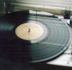 an old record player is sitting on the table