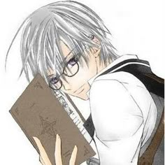 an anime character holding a book in his right hand and looking at the camera while wearing glasses