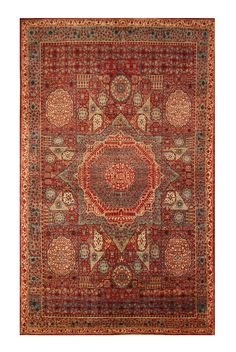 an antique persian rug with red and gold designs on the center, surrounded by smaller circular medallions