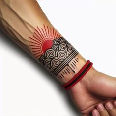 a person with a tattoo on their arm holding onto the wrist and wearing a red bracelet