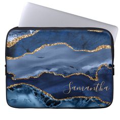 blue and gold marble laptop case with name on the front, featuring an ocean scene